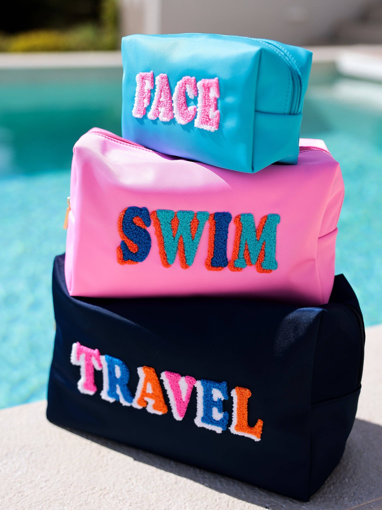 "FACE" SMALL ZIP POUCH
