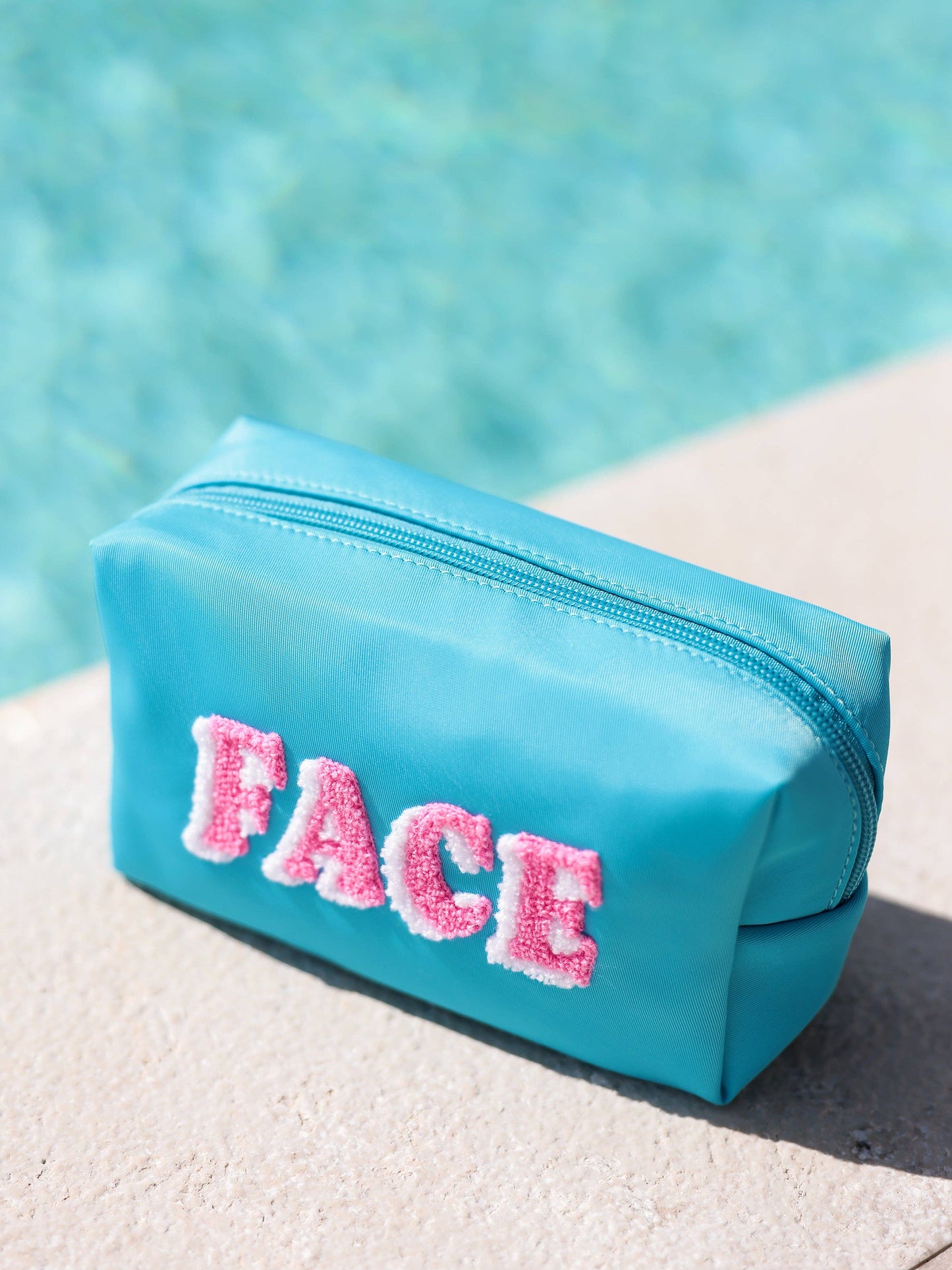 "FACE" SMALL ZIP POUCH
